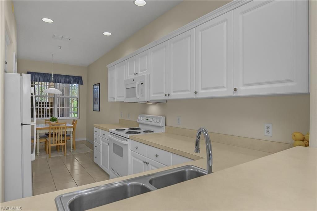 4863 Hampshire Ct, Unit 104, Naples, FL 34112 Photo