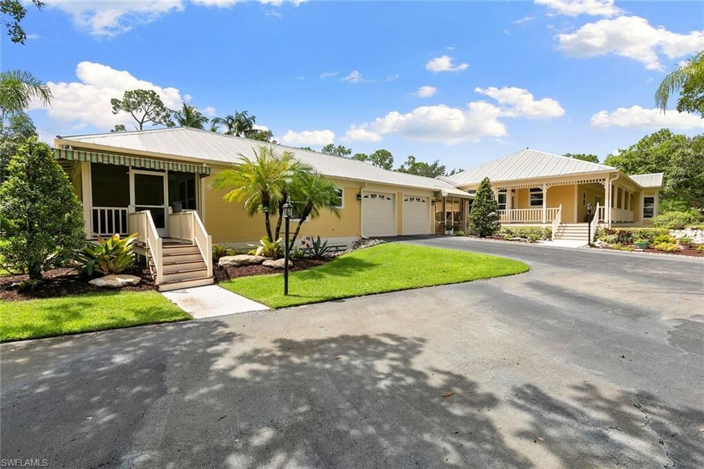 6460 Hidden Oaks Ln, Naples, FL 34119 Photo