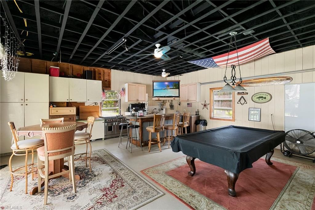 6460 Hidden Oaks Ln, Naples, FL 34119 Photo