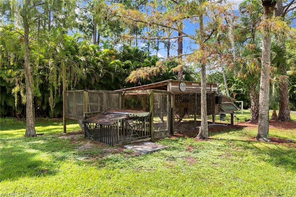 6460 Hidden Oaks Ln, Naples, FL 34119 Photo