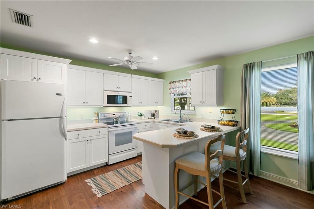 6460 Hidden Oaks Ln, Naples, FL 34119 Photo