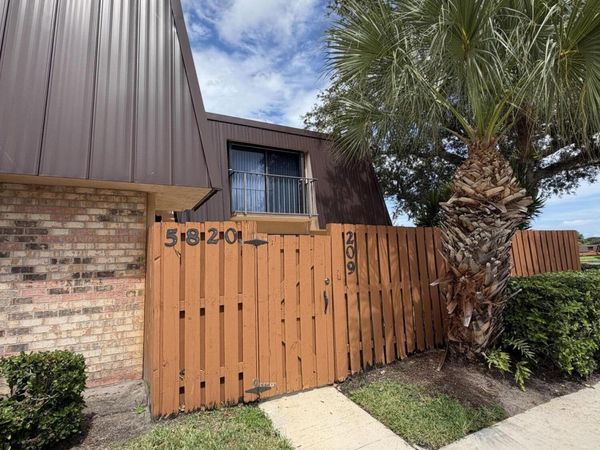 5820 SE WINDSONG Lane, Unit 209, Stuart, FL 34997