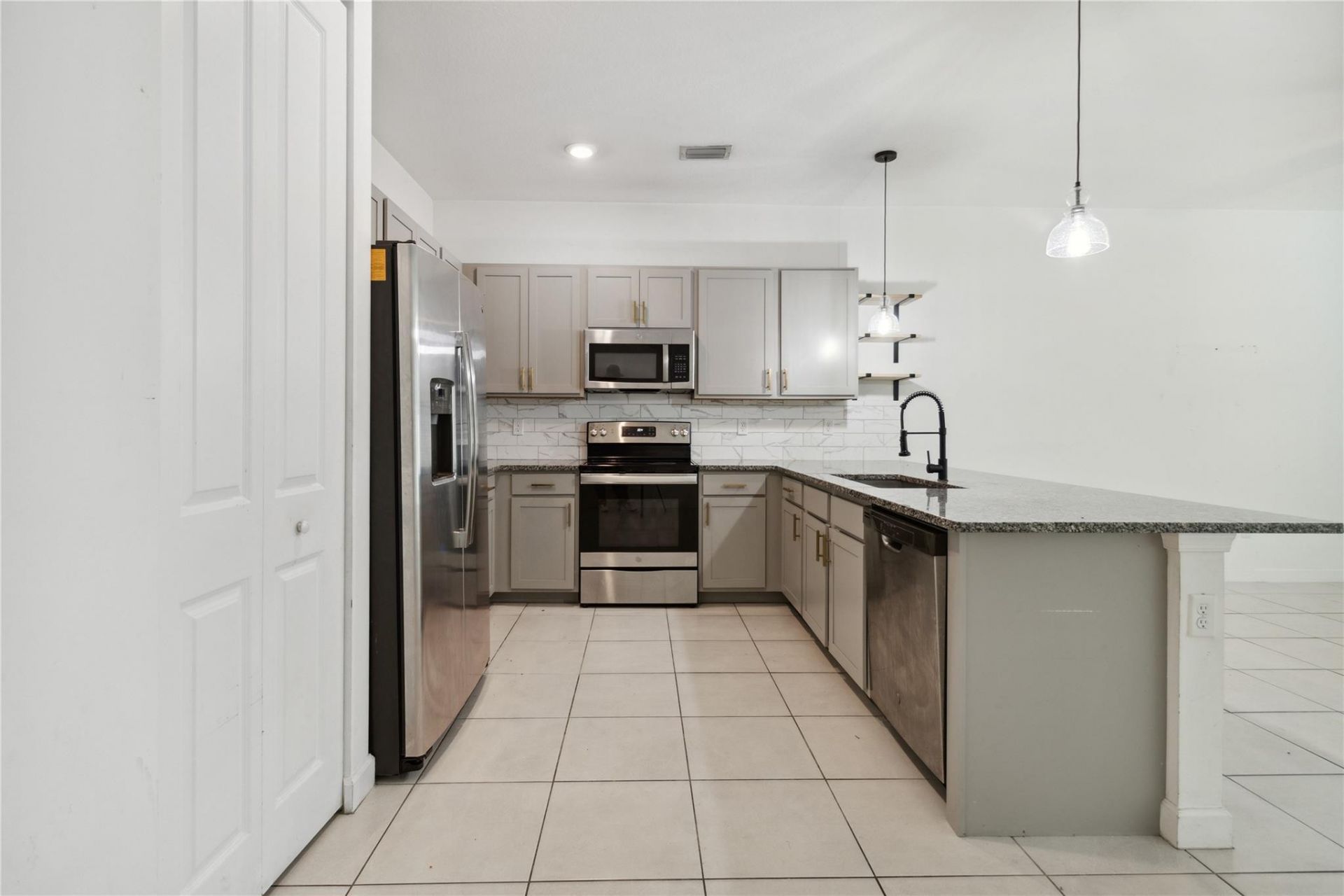 1002 Sweet Briar Lane, Riviera Beach, FL 33410 Photo