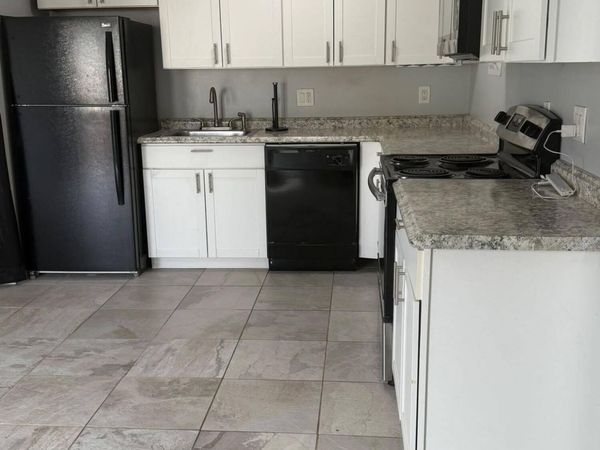645 EXECUTIVE CENTER Drive, Unit R205, West Palm Beach, FL 33401