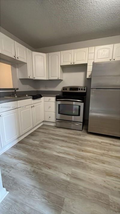 2457 NW 56th Ave , Unit 4-105, Lauderhill, FL 33313 Photo