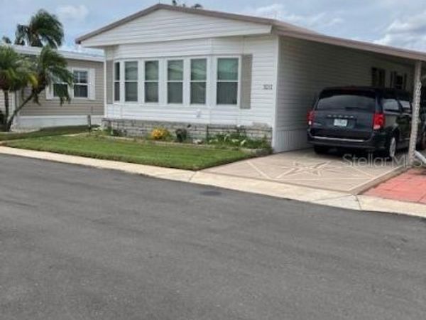 3211 SOUTHPORT DRIVE , HOLIDAY, FL 34690
