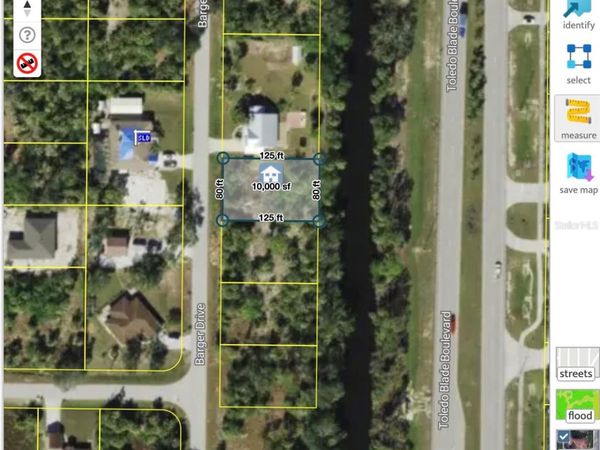 404 BARGER DRIVE, PORT CHARLOTTE, FL 33954