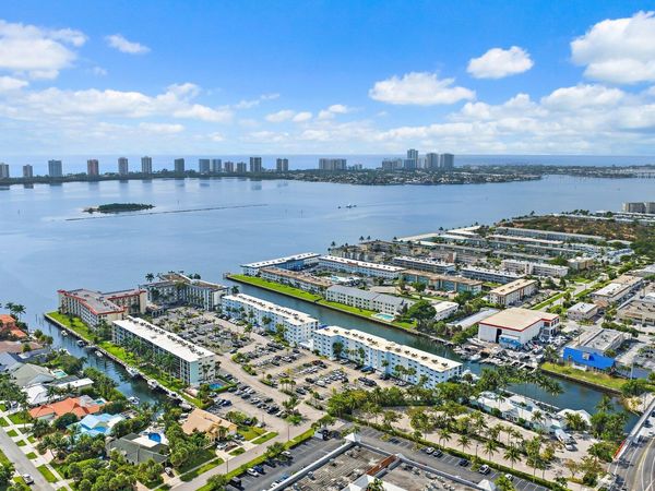 100 PARADISE HARBOUR Boulevard, Unit 202, North Palm Beach, FL 33408