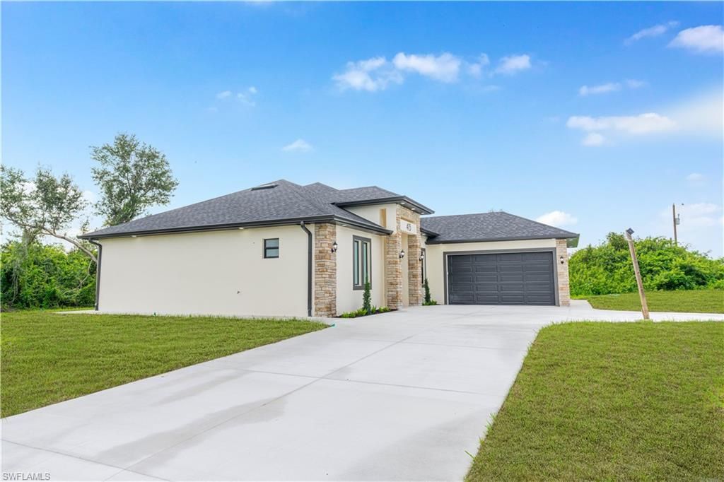 415 Chamonix Ave S, Lehigh Acres, FL 33974 Photo