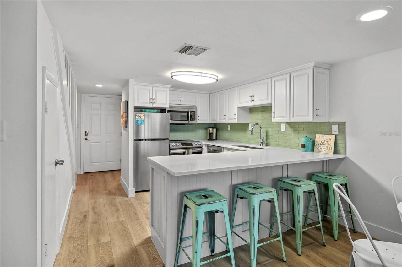 4841 Saxon Drive, Unit F-207, New Smyrna Beach, FL 32169 Photo