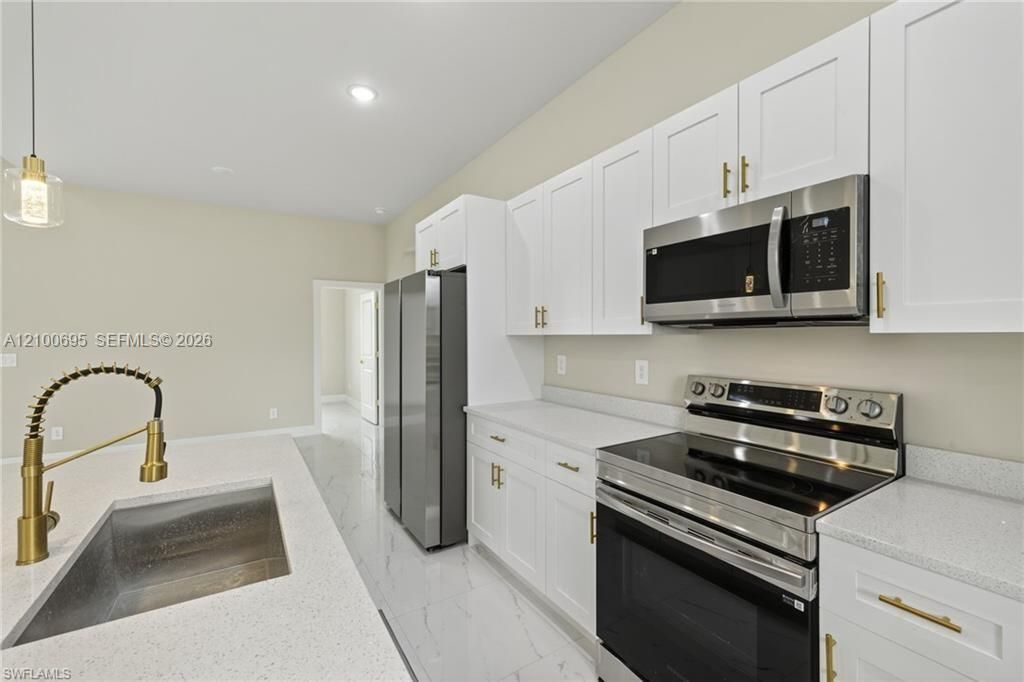 937 E Asther St , Lehigh Acres, FL 33974 Photo