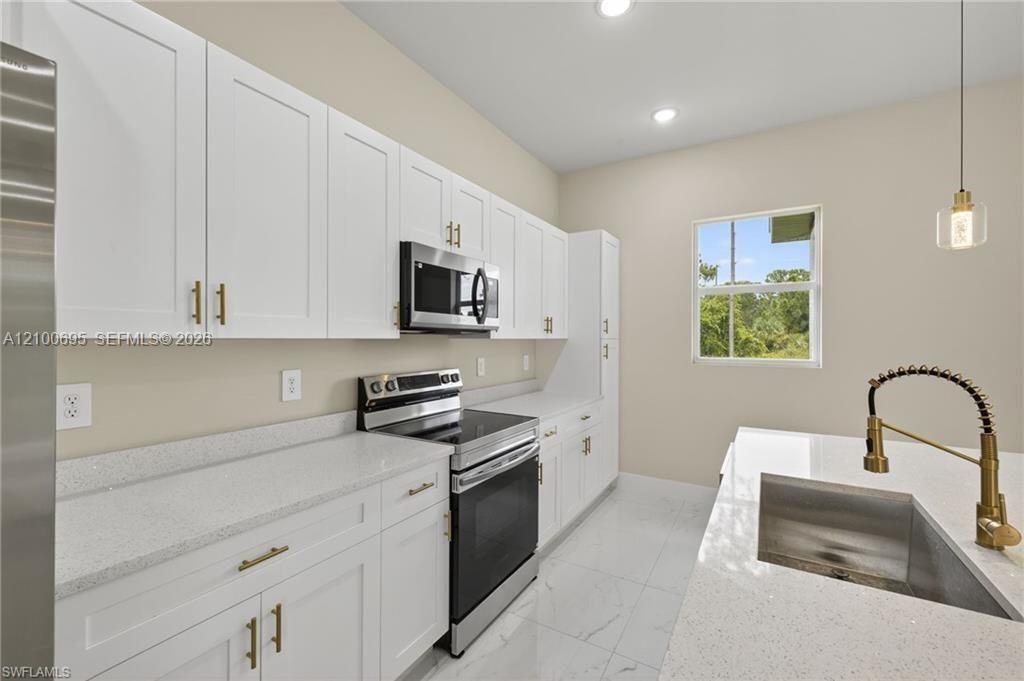 937 E Asther St , Lehigh Acres, FL 33974 Photo