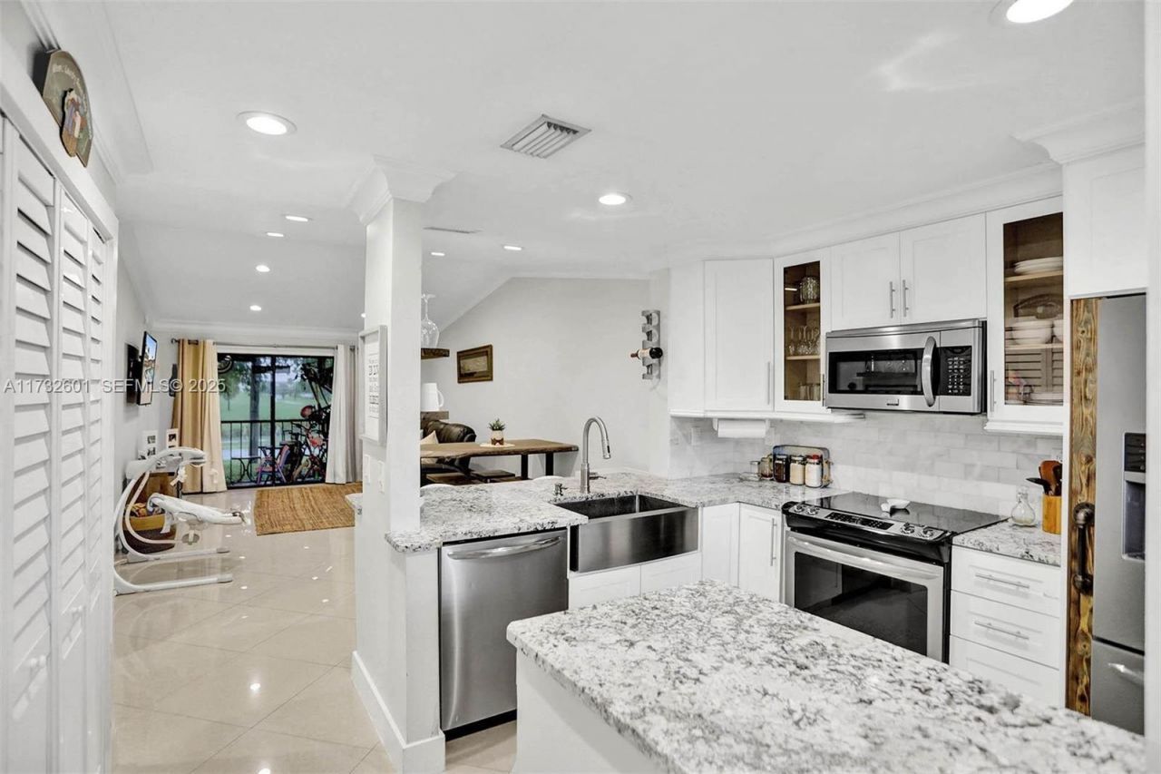 9395 Boca Cove Circle, Unit 1208, Boca Raton, FL 33428 Photo