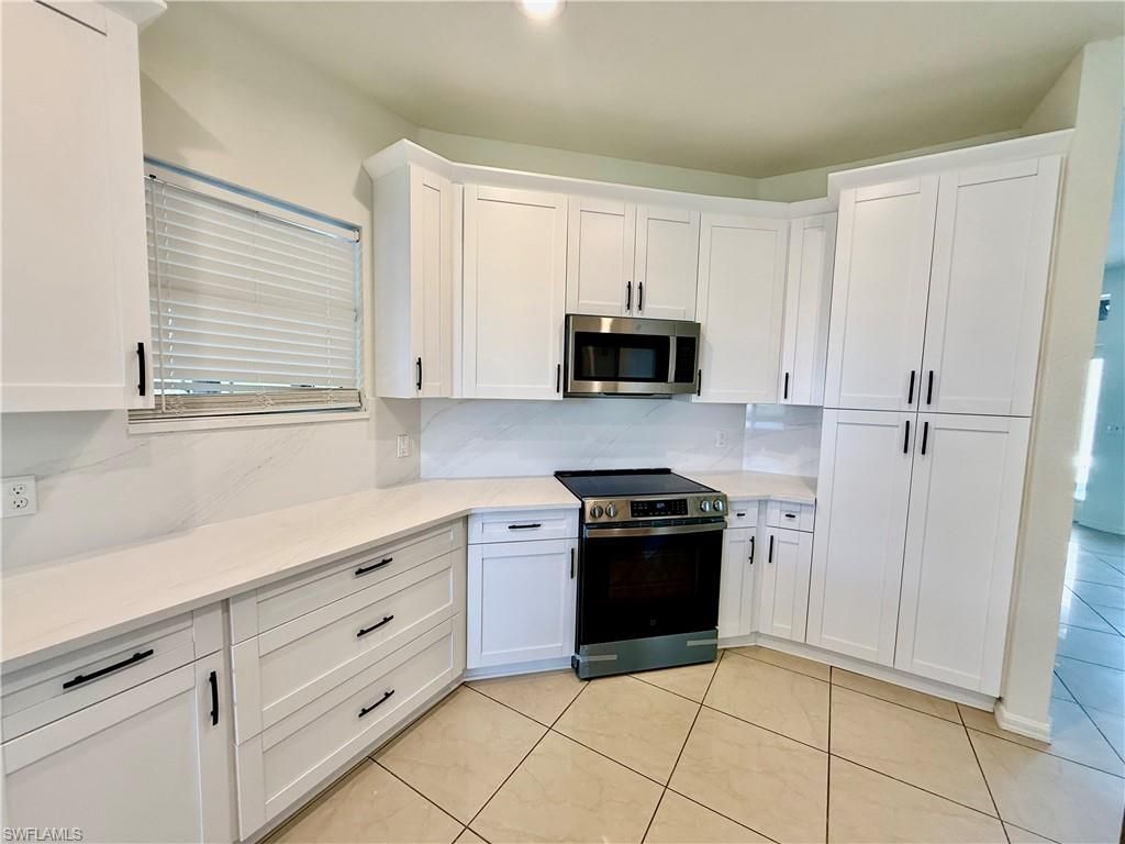 338 Pyramid Ave, Lehigh Acres, FL 33974 Photo