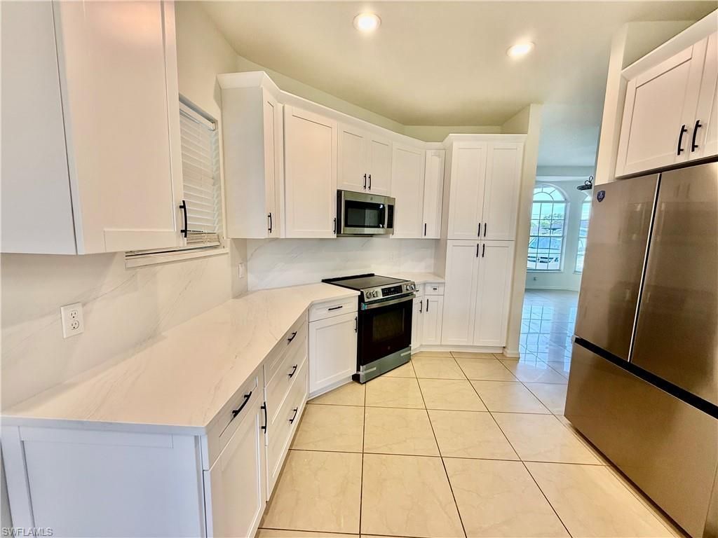 338 Pyramid Ave, Lehigh Acres, FL 33974 Photo