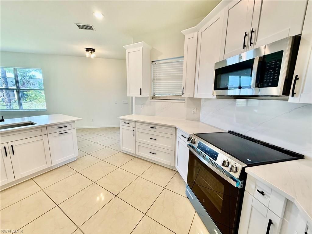 338 Pyramid Ave, Lehigh Acres, FL 33974 Photo