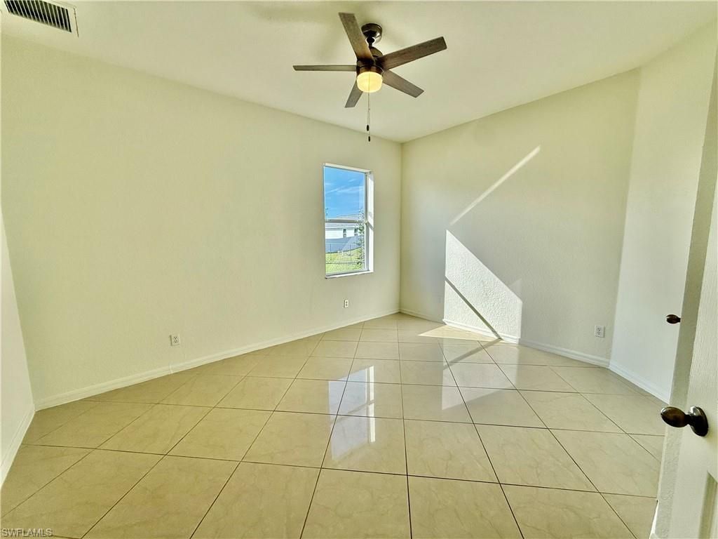 338 Pyramid Ave, Lehigh Acres, FL 33974 Photo