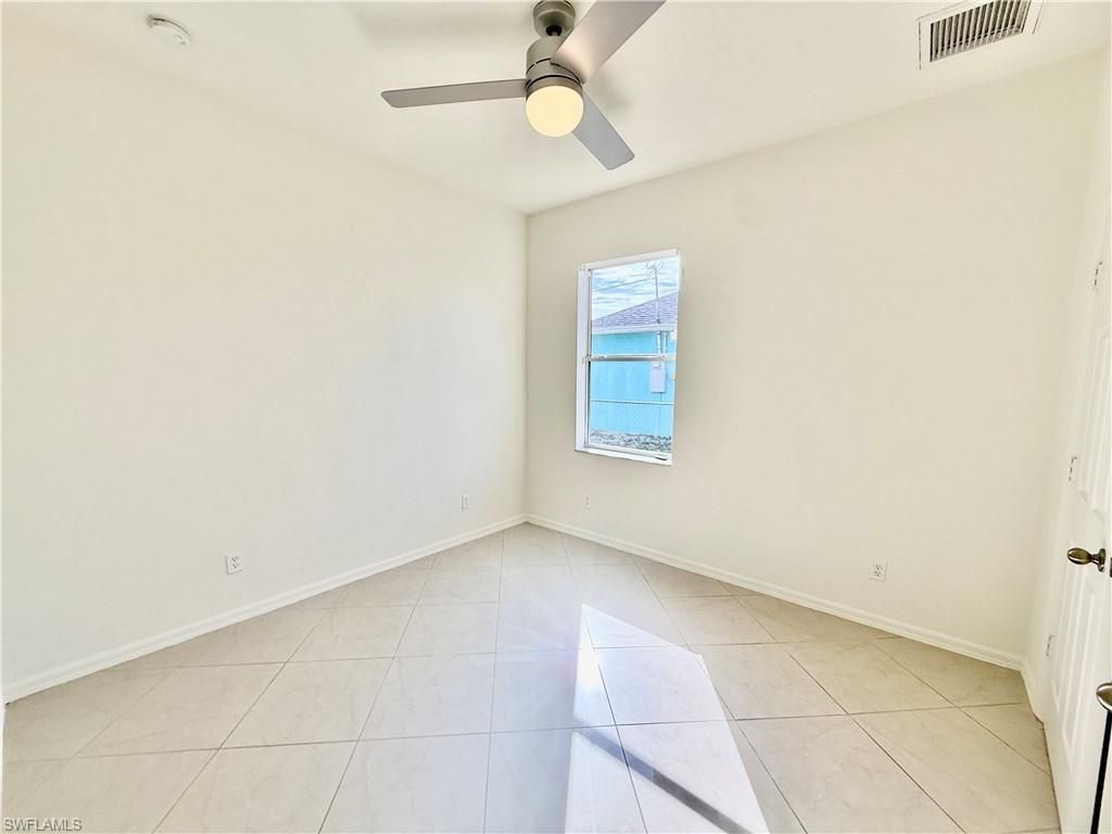 338 Pyramid Ave, Lehigh Acres, FL 33974 Photo