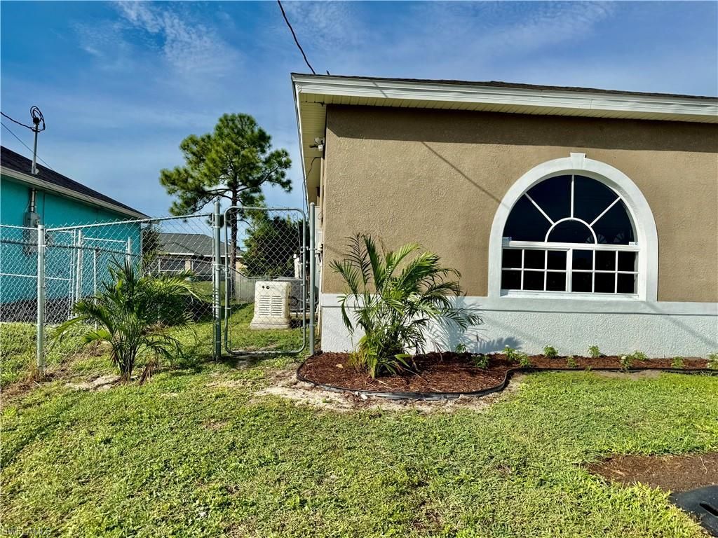 338 Pyramid Ave, Lehigh Acres, FL 33974 Photo