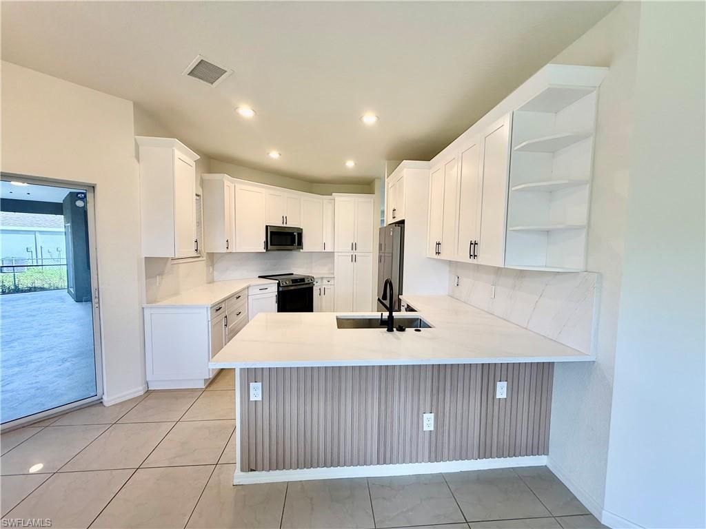 338 Pyramid Ave, Lehigh Acres, FL 33974 Photo