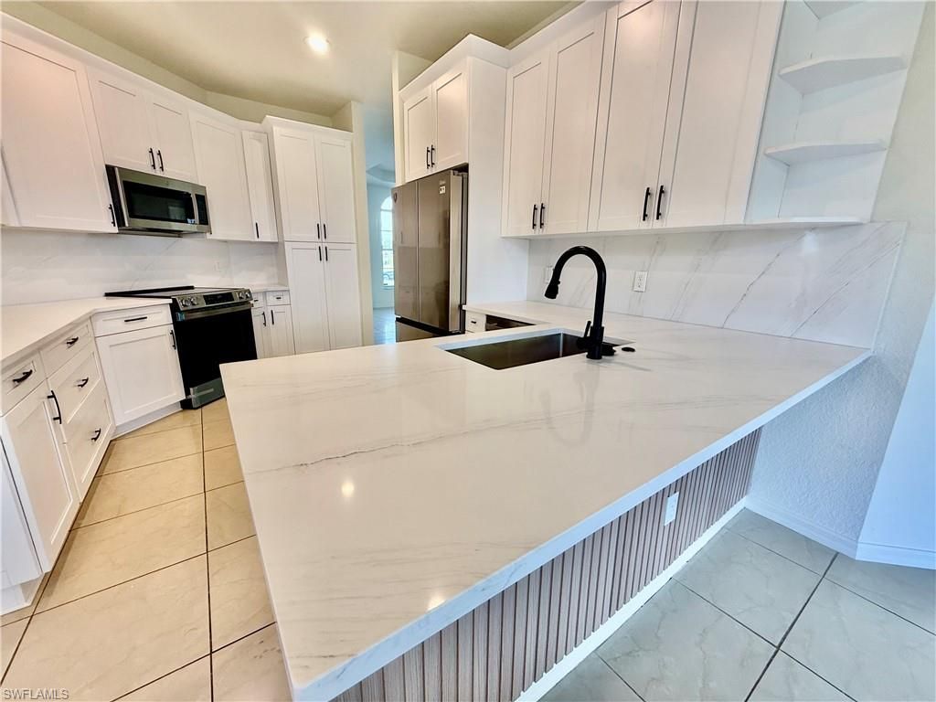 338 Pyramid Ave, Lehigh Acres, FL 33974 Photo
