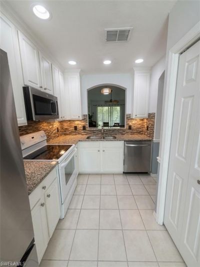 7715 Woodbrook Cir , Unit 3402, Naples, FL 34104 Photo