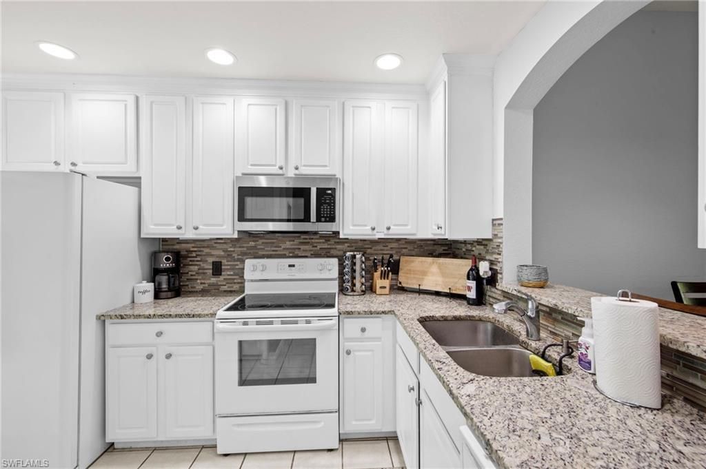 7715 Woodbrook Cir , Unit 3402, Naples, FL 34104 Photo