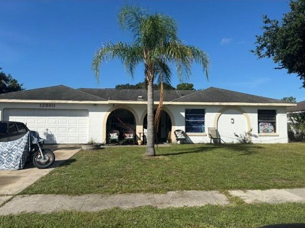 12890 MONTANA WOODS LANE, ORLANDO, FL 32824