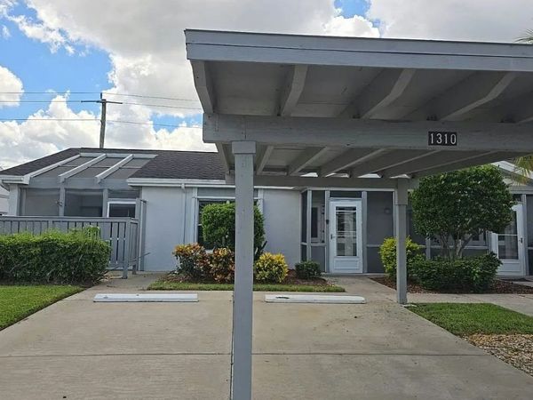 1310 SANDTRAP DR, Lee, FL 33919