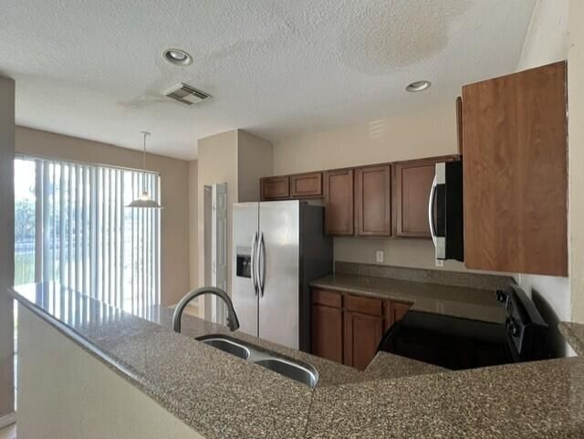 1704 Terra Cotta Drive, Riviera Beach, FL 33404 Photo