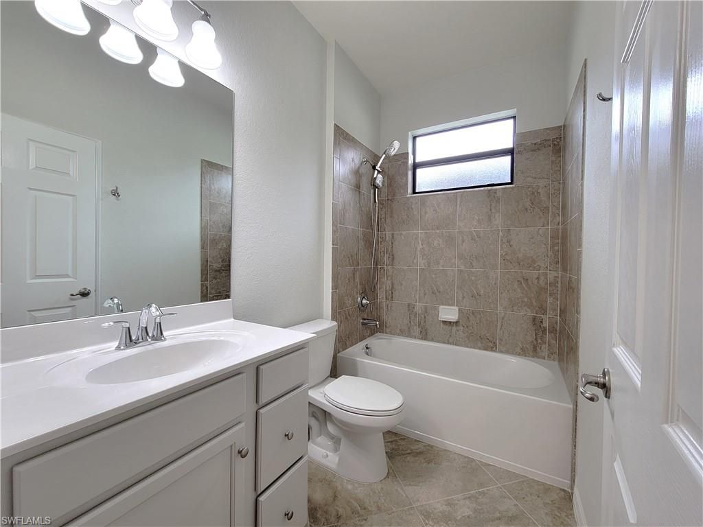 9183 Woodhurst Dr , Naples, FL 34120 Photo