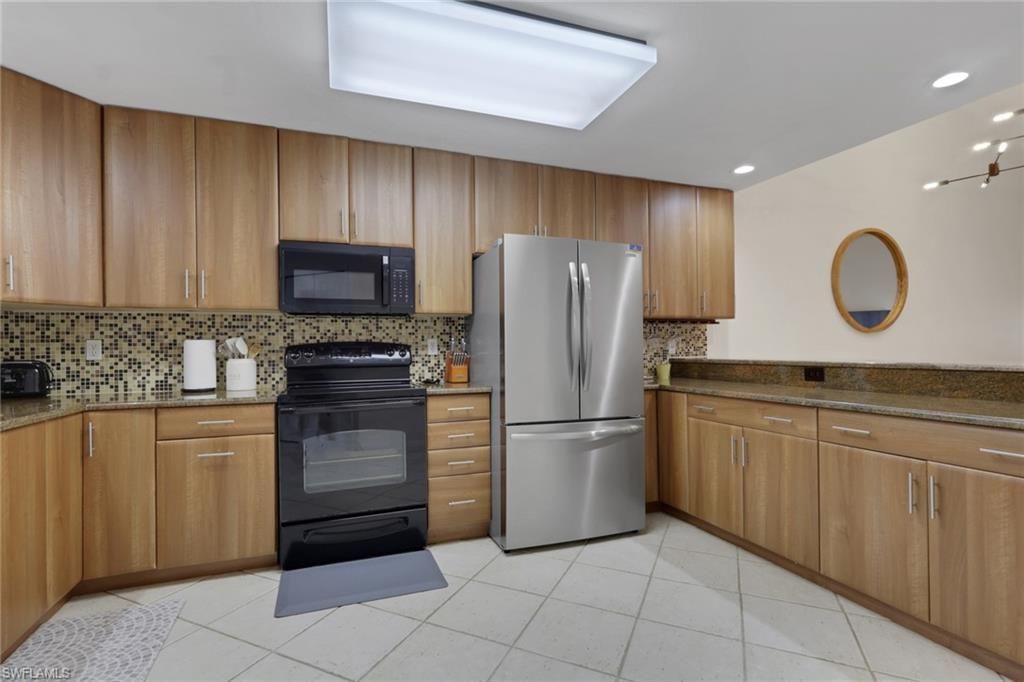 6648 Tannin Ln , Unit B, Naples, FL 34109 Photo