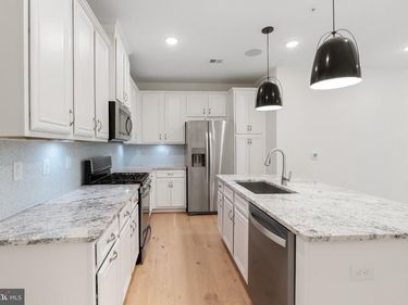1853 MICHAEL FARADAY DRIVE, RESTON, VA 20190
