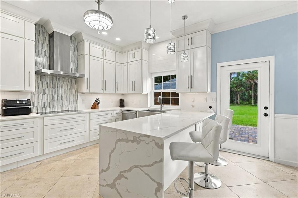 130 1st St Nw, Naples, FL 34120 Photo