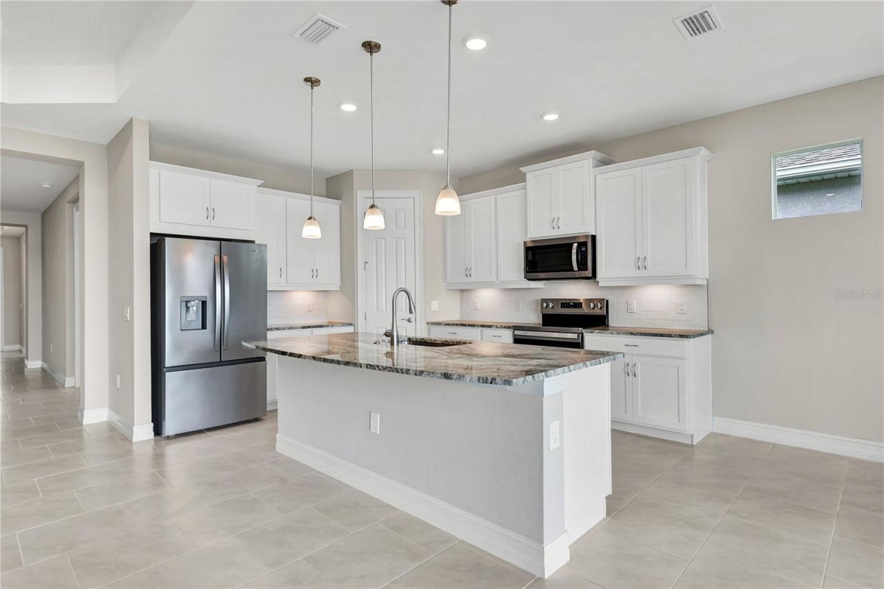 447 Spring Hill Lake Loop , Cape Coral, FL 33993 Photo