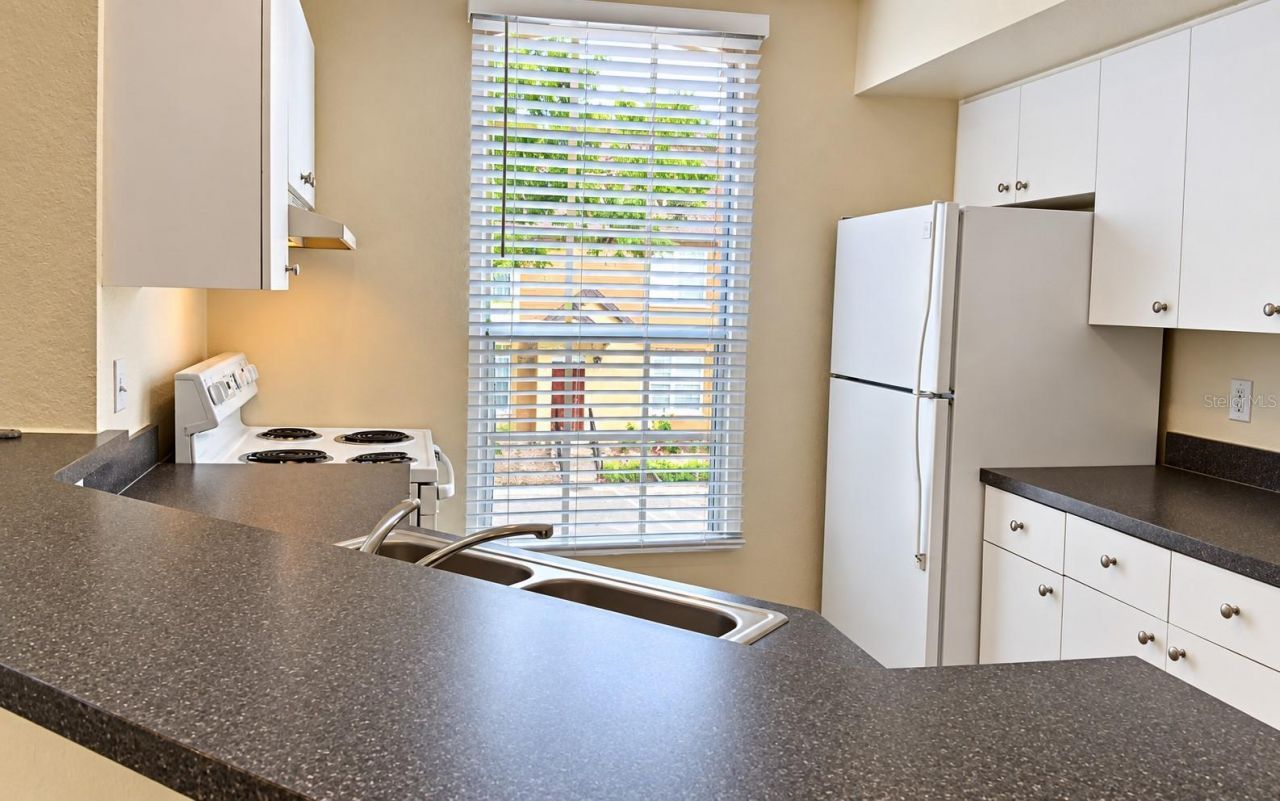 6344 Raleigh Street , Unit 1114, Orlando, FL 32835 Photo