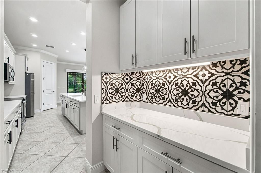 4118 Raffia Dr, Naples, FL 34119 Photo