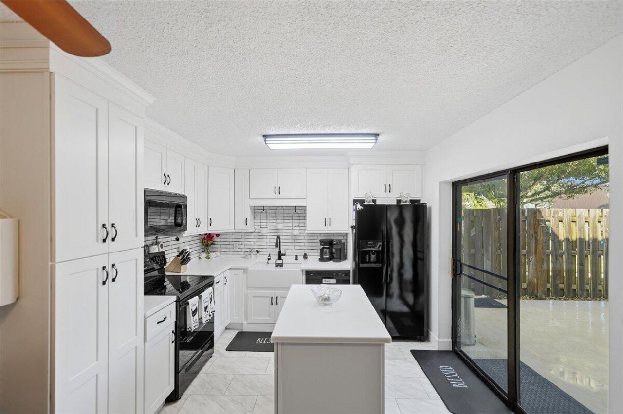 5714 SE Windsong Lane, Unit 327, Stuart, FL 34997 Photo