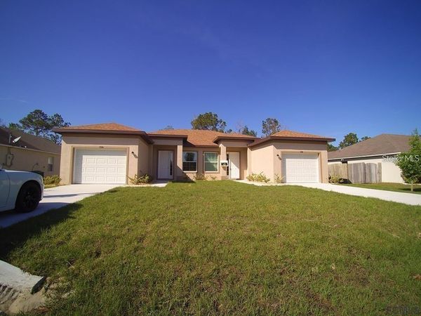 13 WOOD AMBER LANE, Unit B, PALM COAST, FL 32164