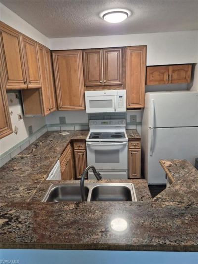 1220 Reserve Way , Unit 107, Naples, FL 34105 Photo