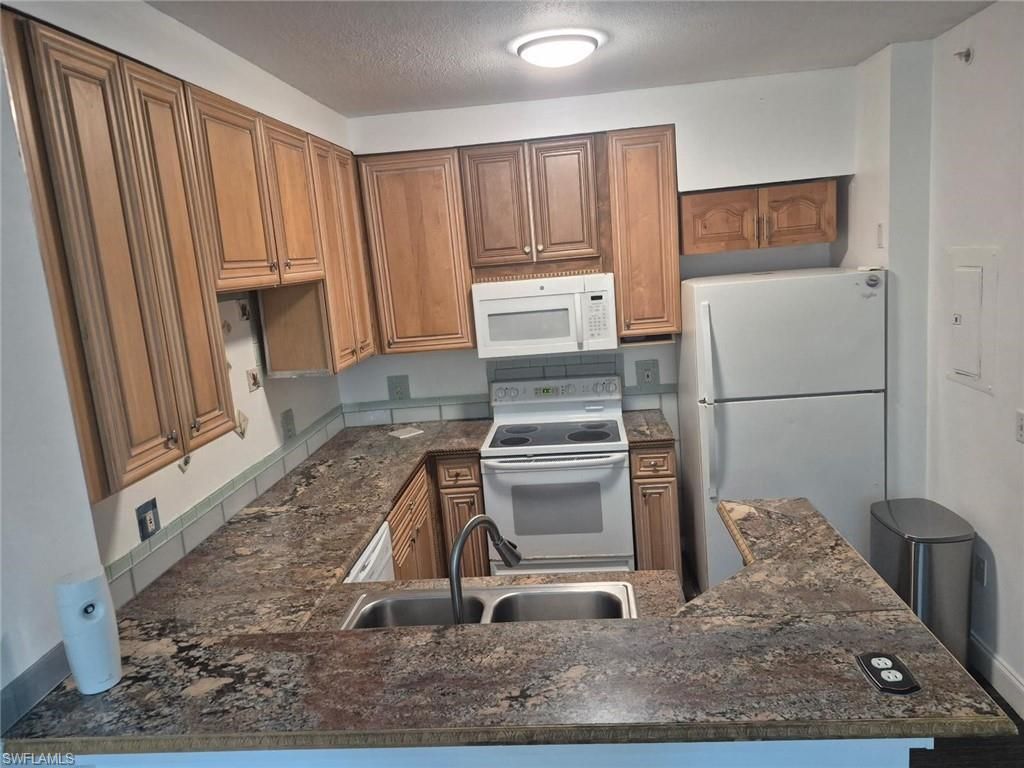 1220 Reserve Way , Unit 107, Naples, FL 34105 Photo