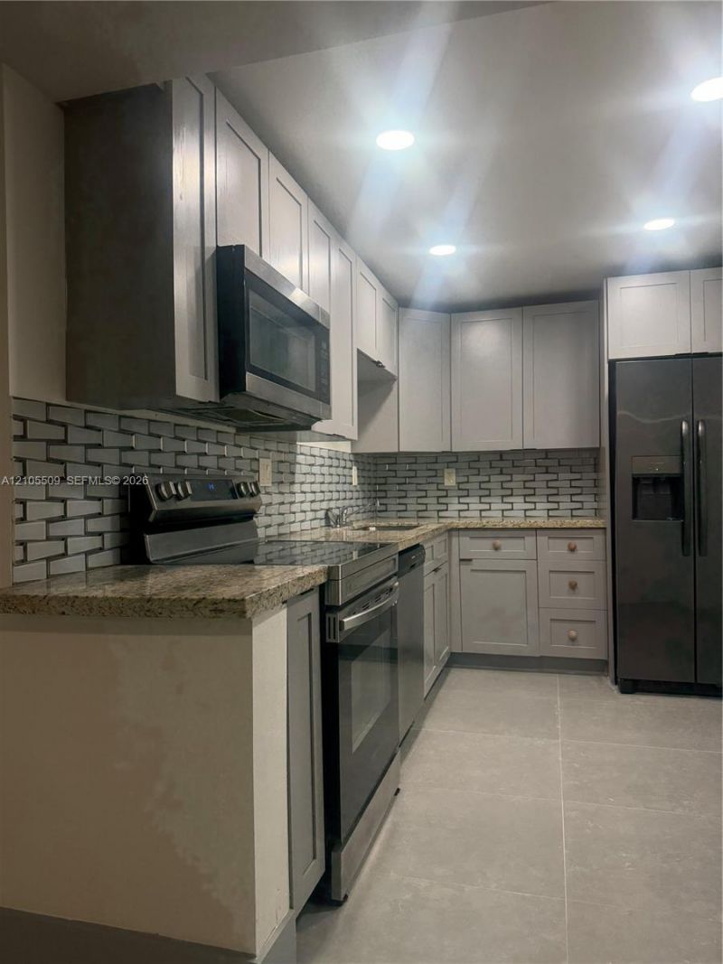8050 W Mcnab Rd , Unit 121, Tamarac, FL 33321 Photo