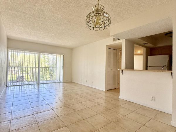 1500 SE ROYAL GREEN Circle, Unit 203, Port St. Lucie, FL 34952
