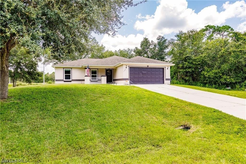 122 Teakwood Dr, Lehigh Acres, FL 33974 Photo
