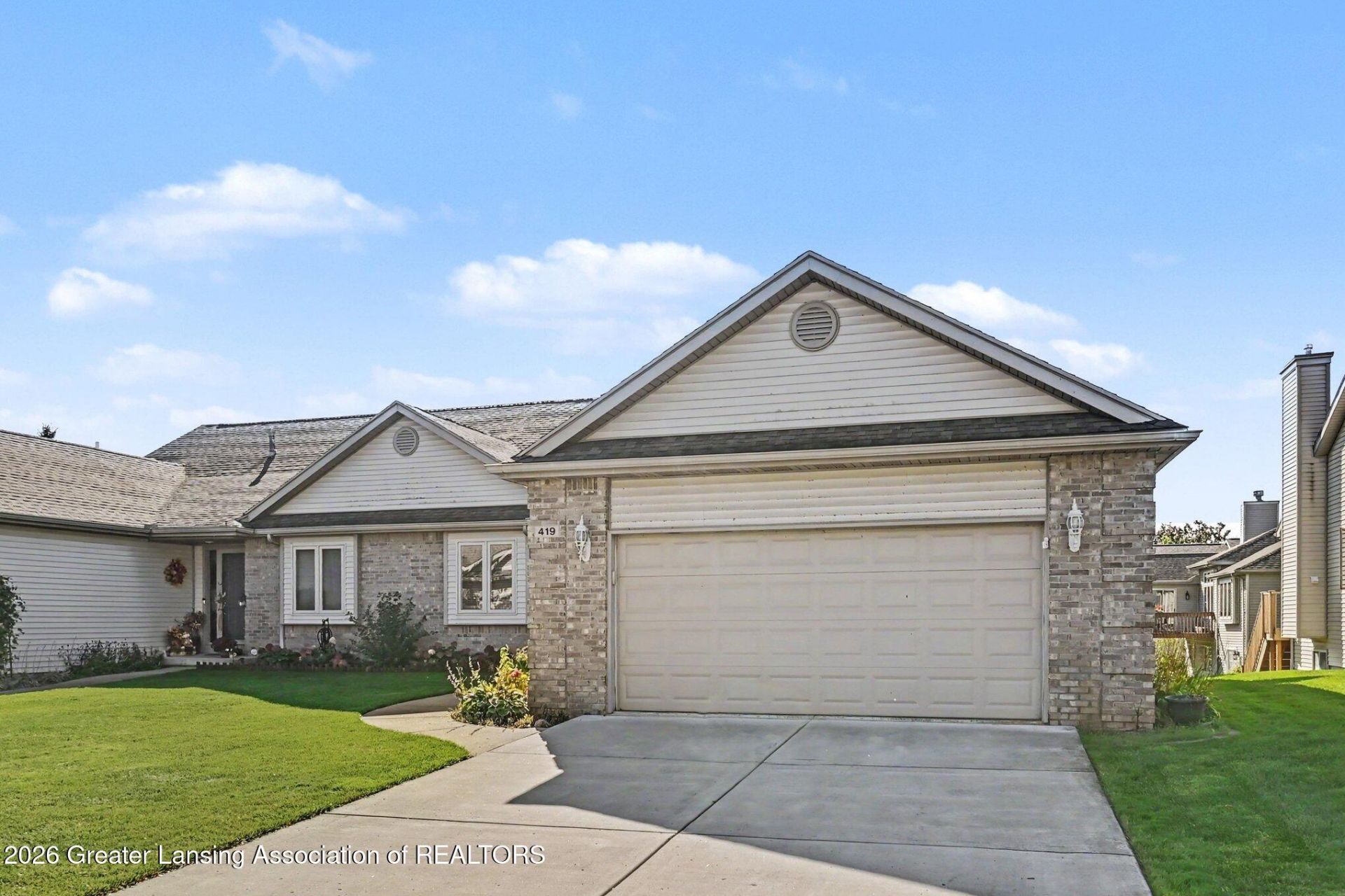 419 White Pine Boulevard, Lansing, MI 48917 Main Photo