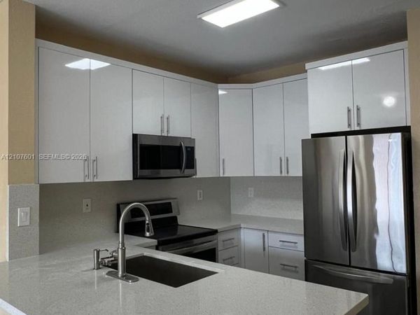7080 NW 177th St , Unit 203-13, Hialeah, FL 33015