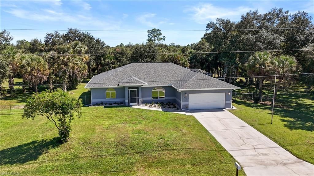 418 Edison Ave, Lehigh Acres, FL 33972 Main Photo