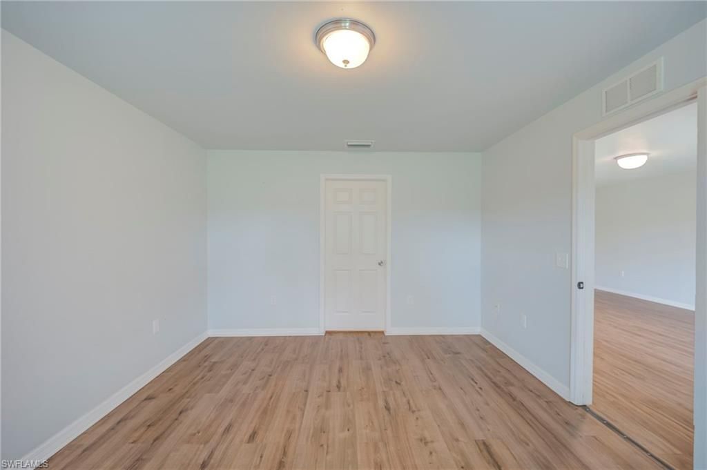 313 Shadow Lakes Dr , Lehigh Acres, FL 33974 Photo