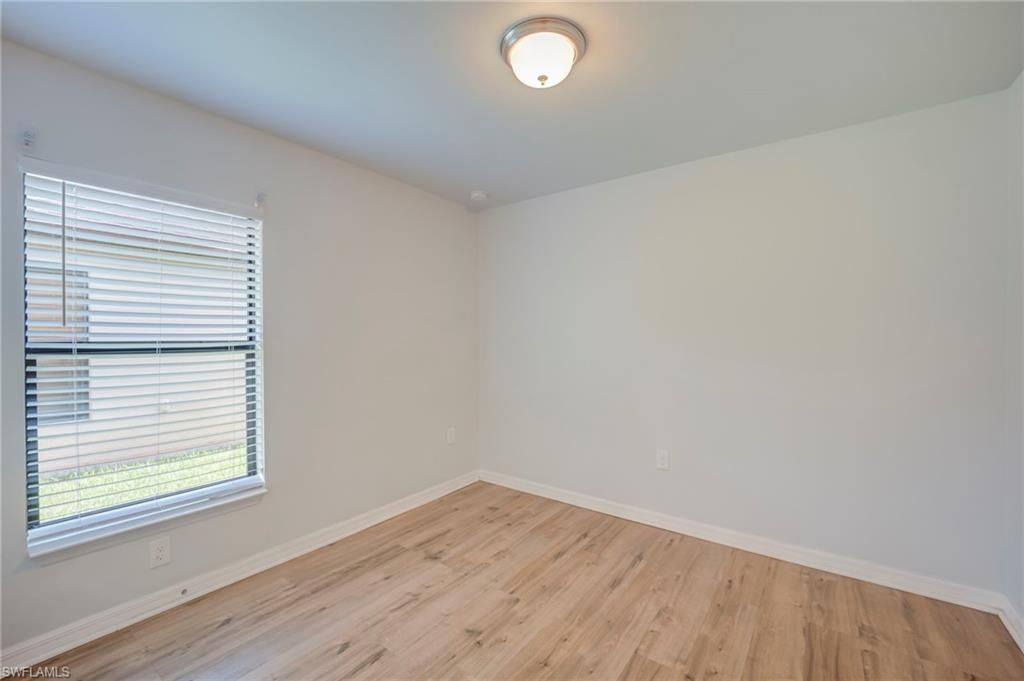 313 Shadow Lakes Dr , Lehigh Acres, FL 33974 Photo