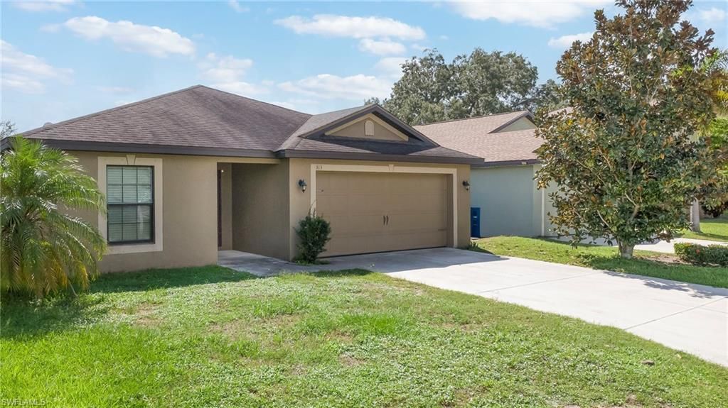 313 Shadow Lakes Dr , Lehigh Acres, FL 33974 Photo